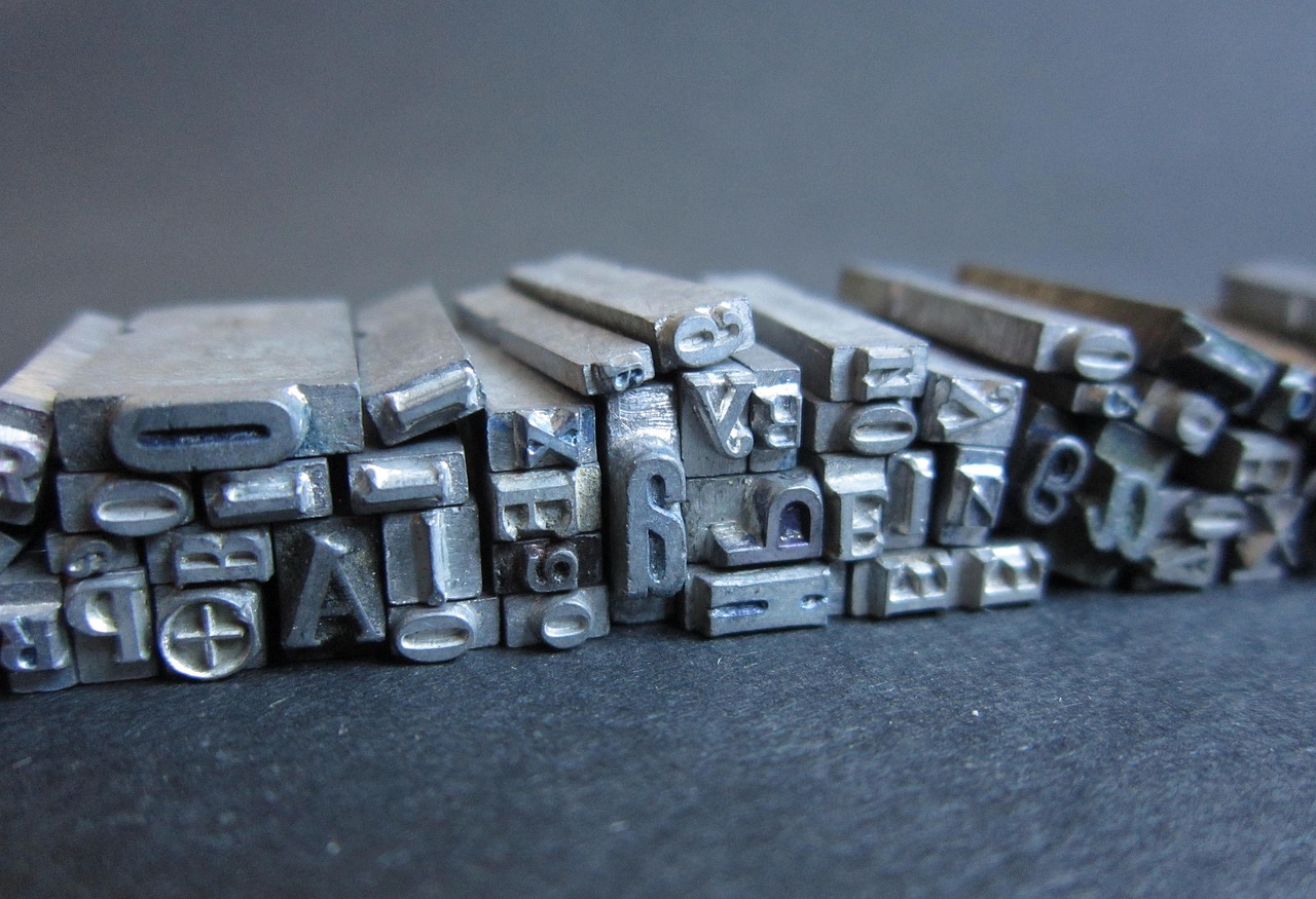 Close-up of metal letterpress type blocks used for printing