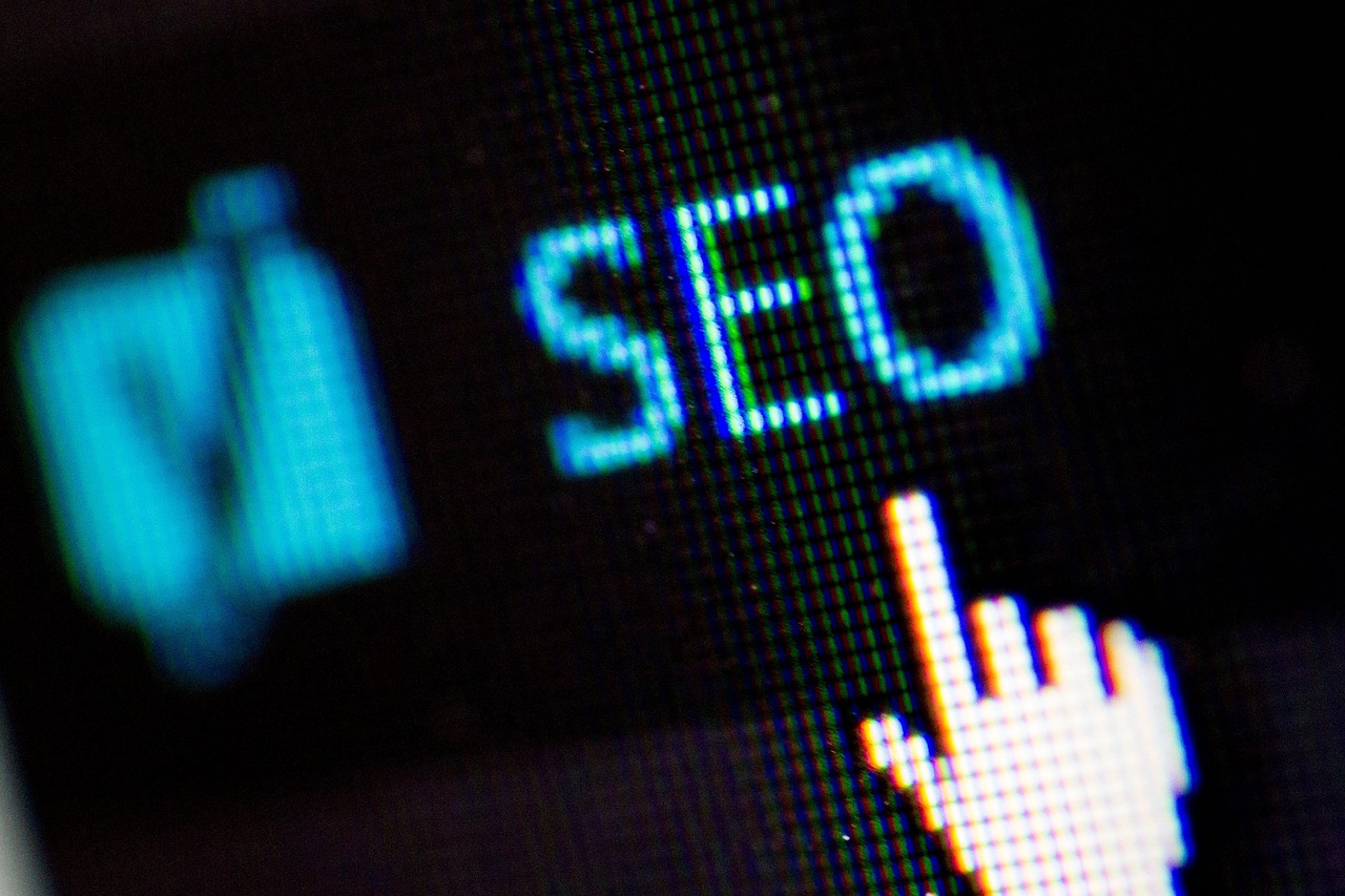 Laptop screen showing SEO and search engine optimisation keywords